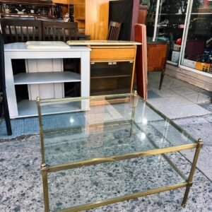 Mesa ratona de vidrio con bronce