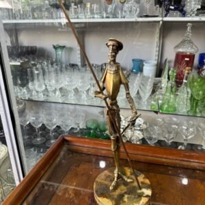 Don quijote de bronce con base de marmol