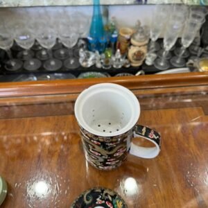 Taza con tapa y colador interno para el té