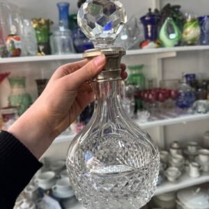 Botellón de cristal súper tallado con platería