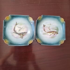 2 platos de pescado o sushi