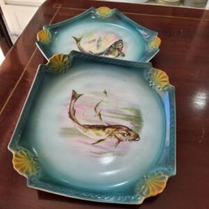 2 platos de pescado o sushi