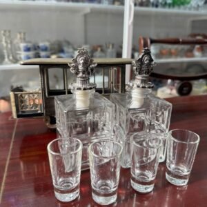 Tren musical con 2 botellones y 4 vasos