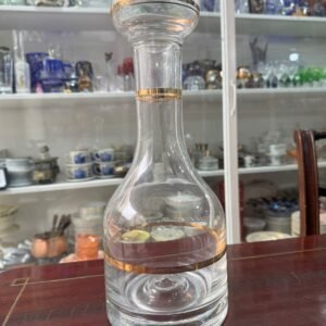 Botellón de cristal con dorado