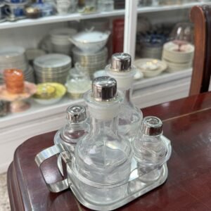 Set salero, pimentero, aceitera, vinagrera con el soporte