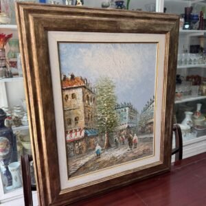 Pintura al oleo con marco dorado