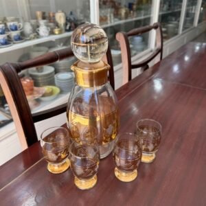 Set de botellón con 4 copas de cristal