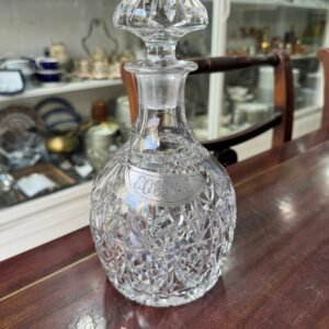 Exquisito botellón de cristal súper tallado con plata