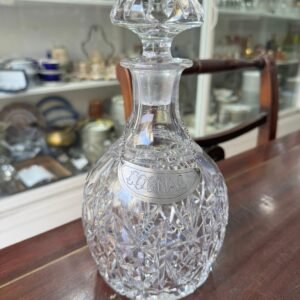 Exquisito botellón de cristal súper tallado con plata