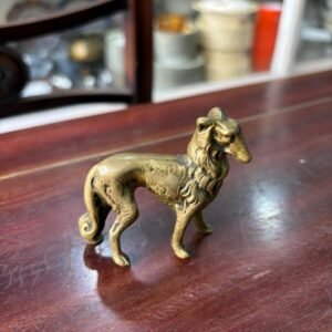 Figura perro de bronce