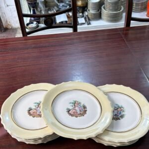 Juego de 12 platos playos con escena galante