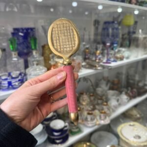 Destapador de bronce