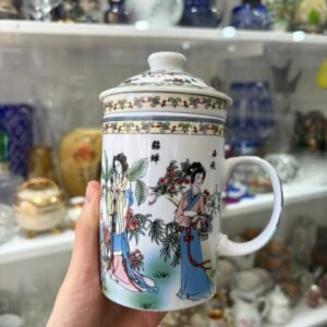 Taza con tapa con colador para té