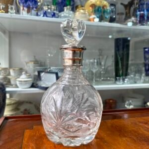 Botellón de cristal súper tallado con platería