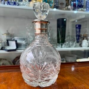 Botellón de cristal súper tallado con platería
