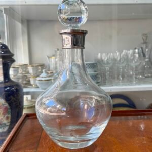 Botellón de cristal con pico metalico