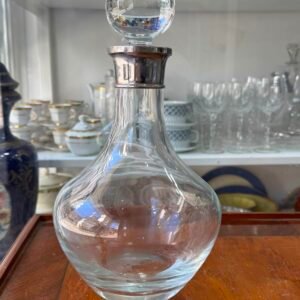 Botellón de cristal con pico metalico