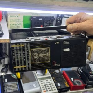 Radiograbador mini JVC a pilas con su transformador