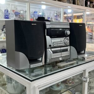 Equipo de música AIWA con su control remoto