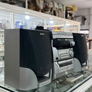 Equipo de música AIWA con su control remoto