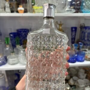 Botellón de vidrio prensado