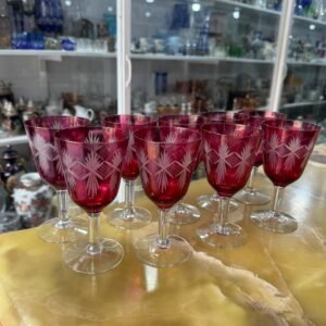 Juego de 9 copas rosadas talladas