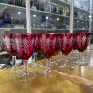 Juego de 9 copas rosadas talladas