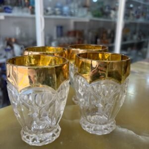 Set de 4 vasos de vidrio prensado con dorado